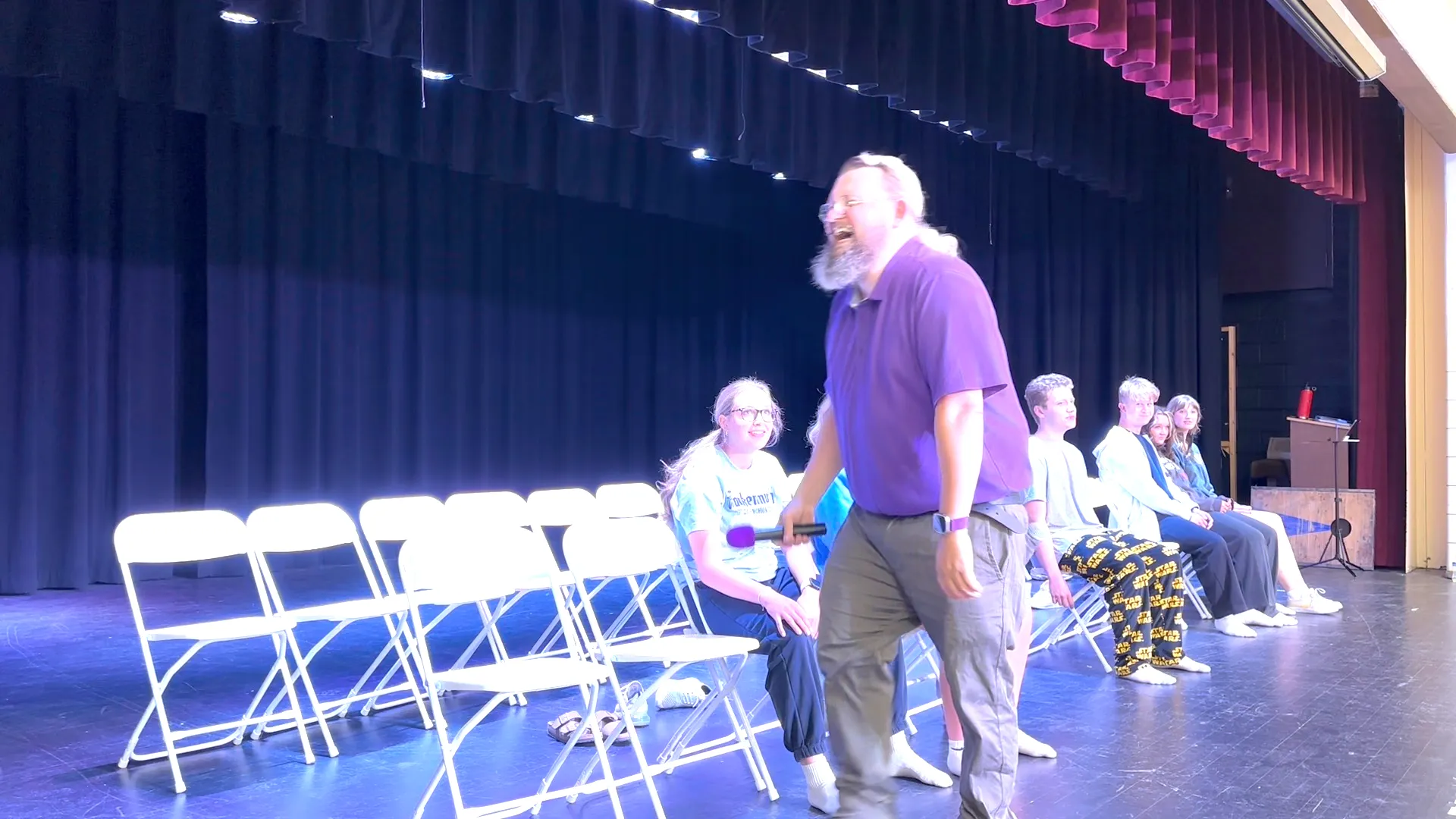 Roger caught laughing mid-show